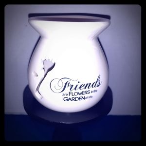 A fragrance tart or oil warmer.